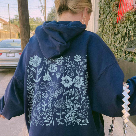 Navy Blue Hoodie with light blue wildflower design on the back, granola girl aesthetic