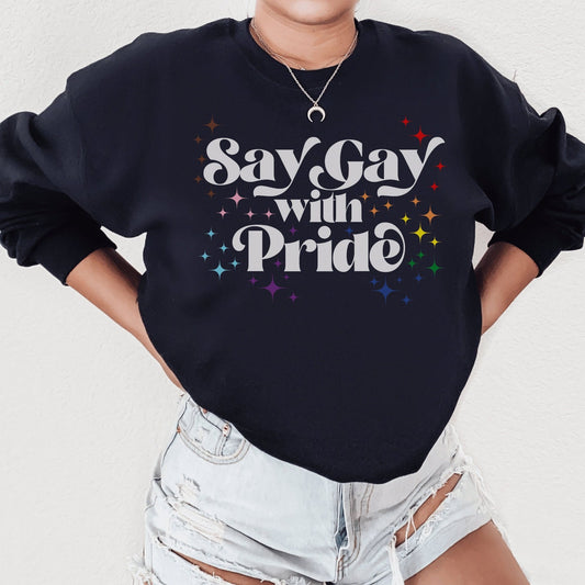 black unisex say gay shirt, a sweatshirt with white lettering and retro stars colored with pride and transgender flag colors