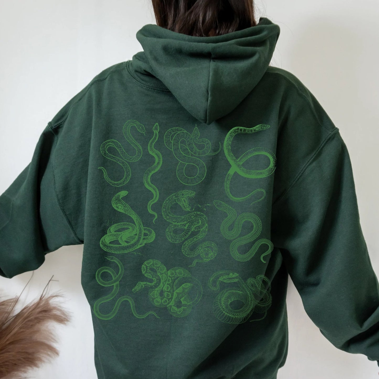 forest green snake hoodie with green snake print on back of hoodie