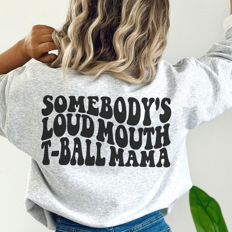 light gray unisex tball mom shirt that says somebody's loudmouth t-ball mama