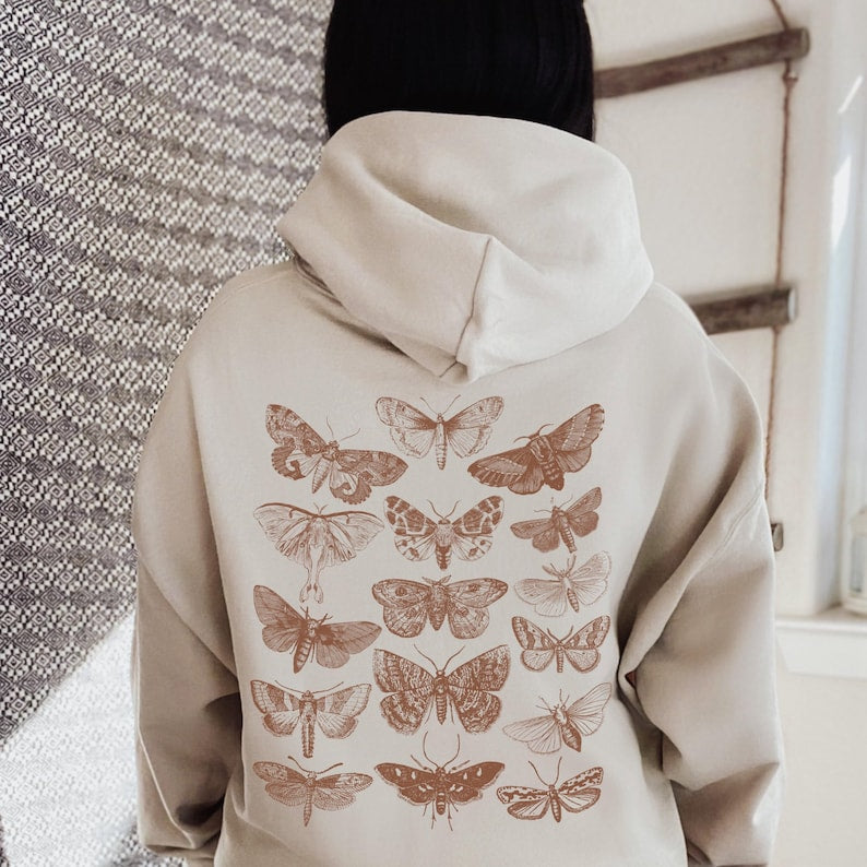 tan Moth Hoodie with tan colored moths on the back of the hoodie