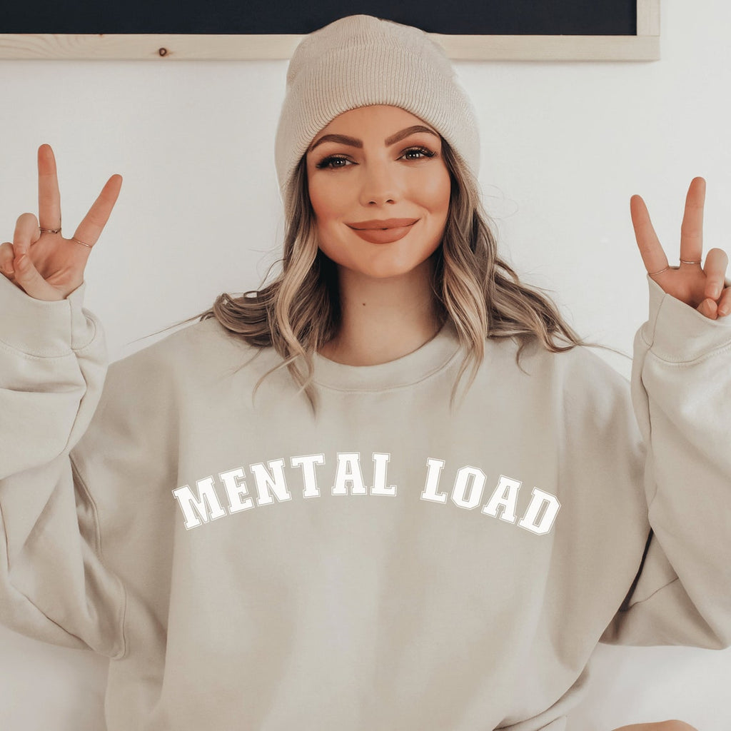 beige unisex overstimulated mom sweatshirt that says mental load