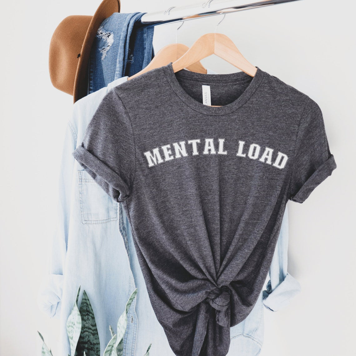 dark gray unisex overstimulated mom shirt that says mental load