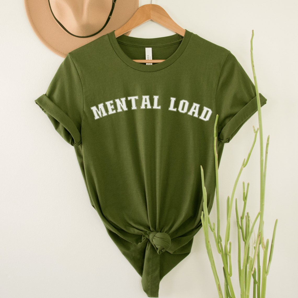 olive unisex overstimulated mom shirt that says mental load