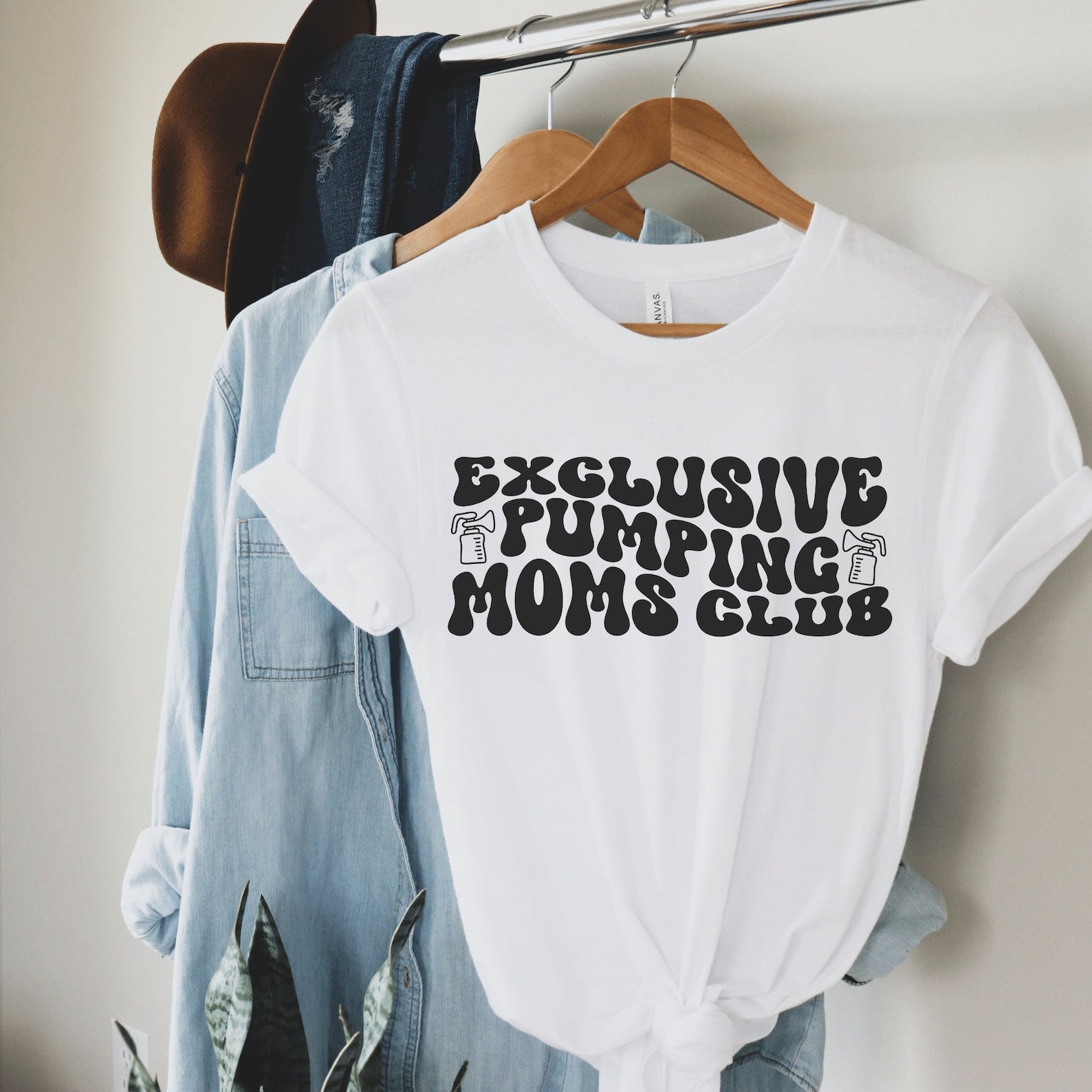 white unisex funny breastfeeding shirts that says exclusive pumping moms club in retro styled black letters