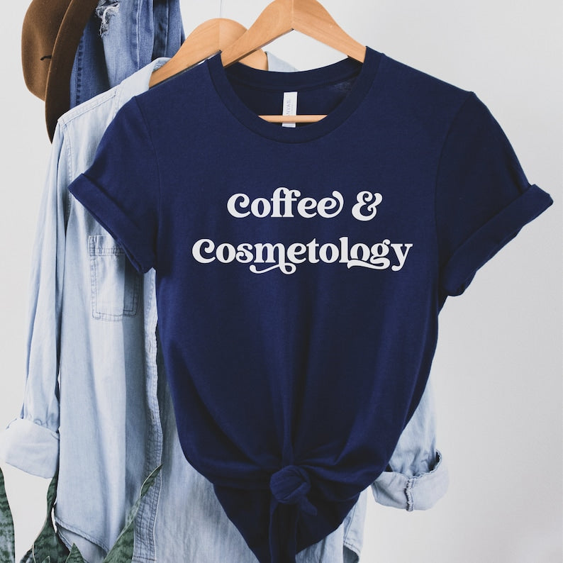 navy blue unisex t-shirt and cosmetology gift ideas that says coffee and cosmetology across the front in stylish font