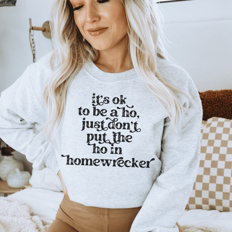 light gray unisex cheater shirt sweatshirt that says its ok to be a ho, just don't put the ho in homewrecker