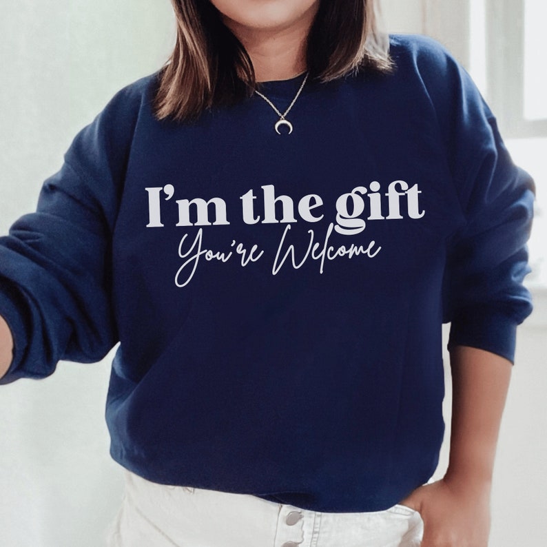 navy blue unisex sassy sweatshirt that says i'm the gift you're welcome in white lettering