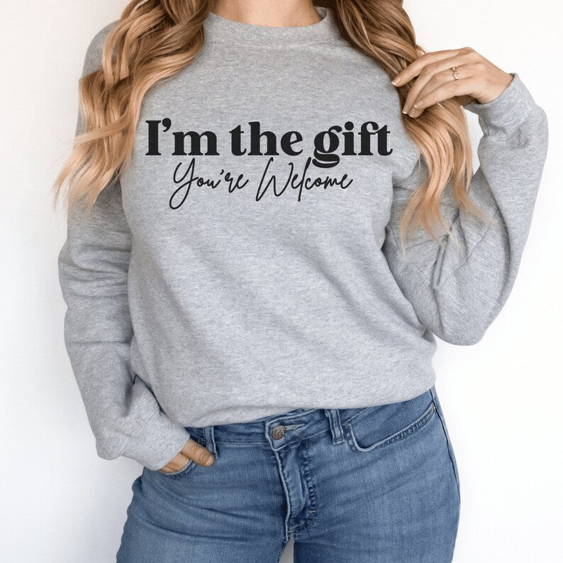 gray unisex sassy sweatshirt that says i'm the gift you're welcome in black lettering