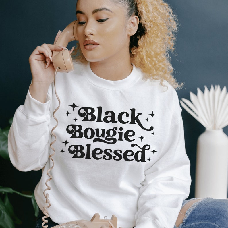 white unisex black bougie blessed sweatshirt on black female model