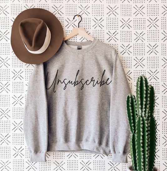 gray unisex introvert clothing which is a sweatshirt that says unsubscribe