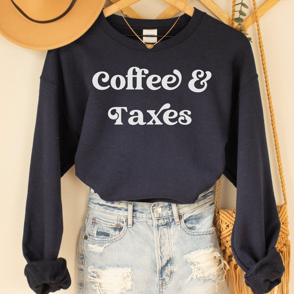 navy blue unisex gift for accountant graduate sweatshirt that says coffee & taxes