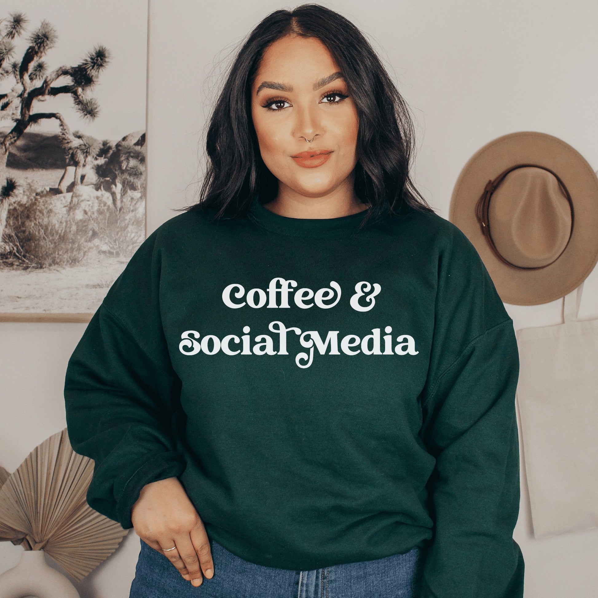 forest green unisex sweatshirt that says coffee and social media, great gifts for social media managers