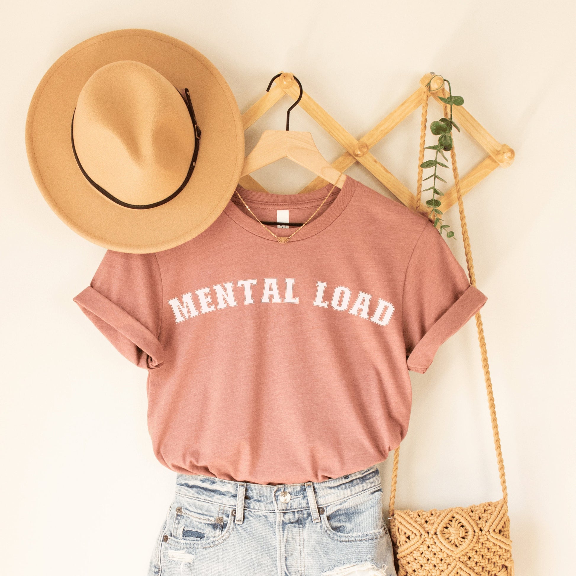 heather mauve unisex overstimulated mom shirt that says mental load