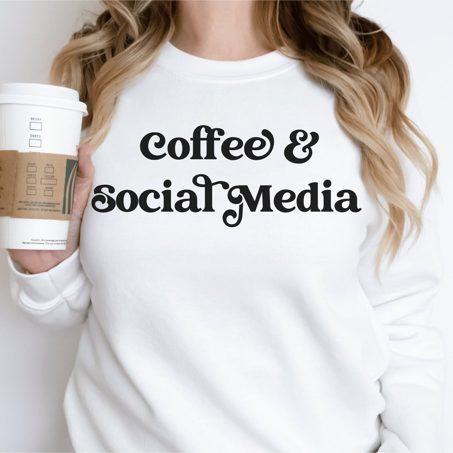 white unisex sweatshirt that says coffee and social media, great gifts for social media managers