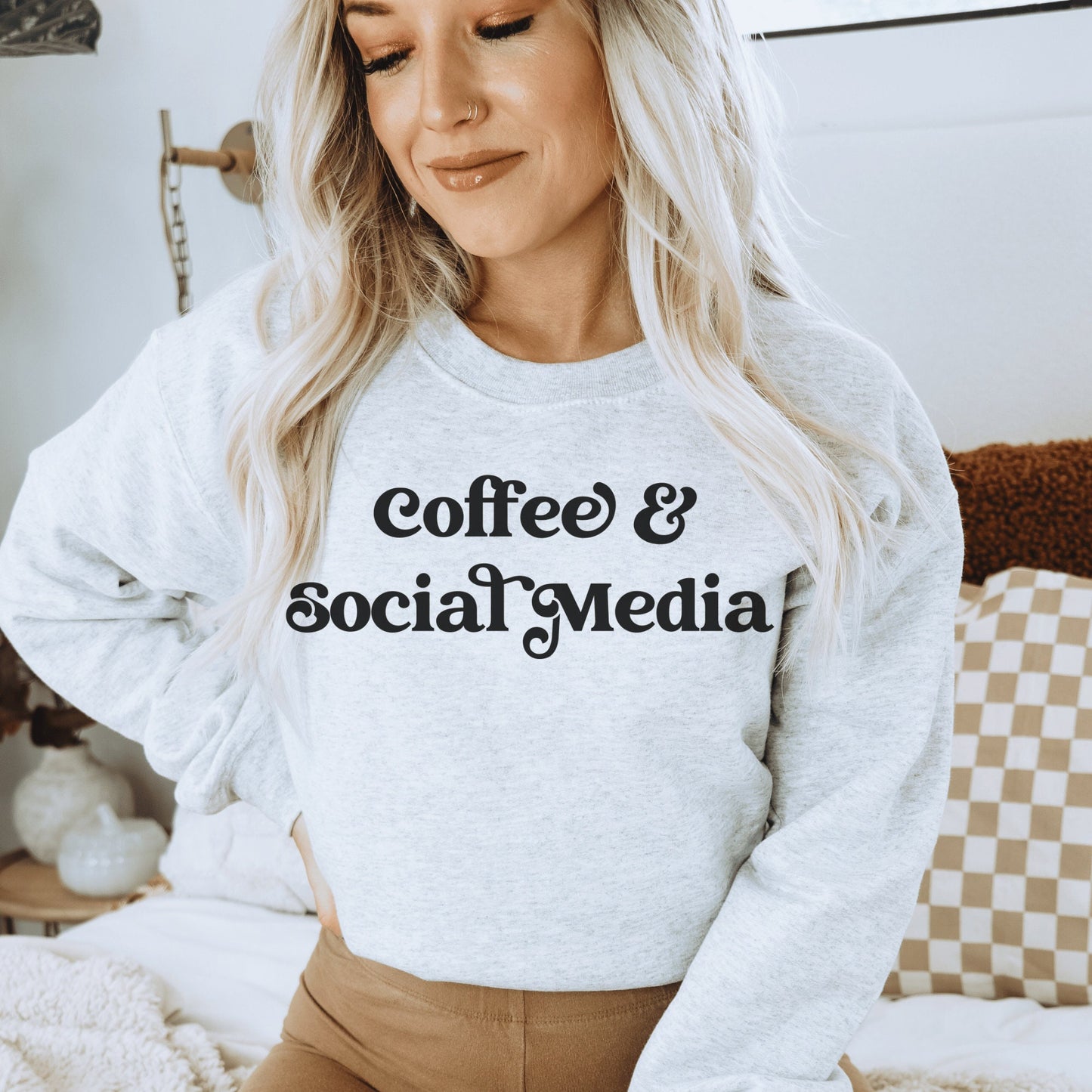 light gray unisex sweatshirt that says coffee and social media, great gifts for social media managers