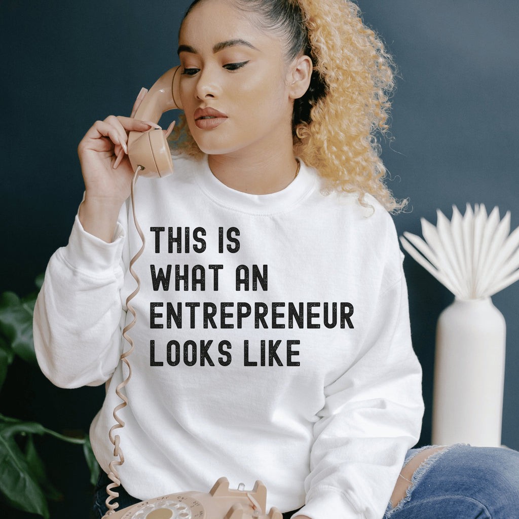 white  unisex entrepreneur sweatshirt that says this is what an entrepreneur looks like