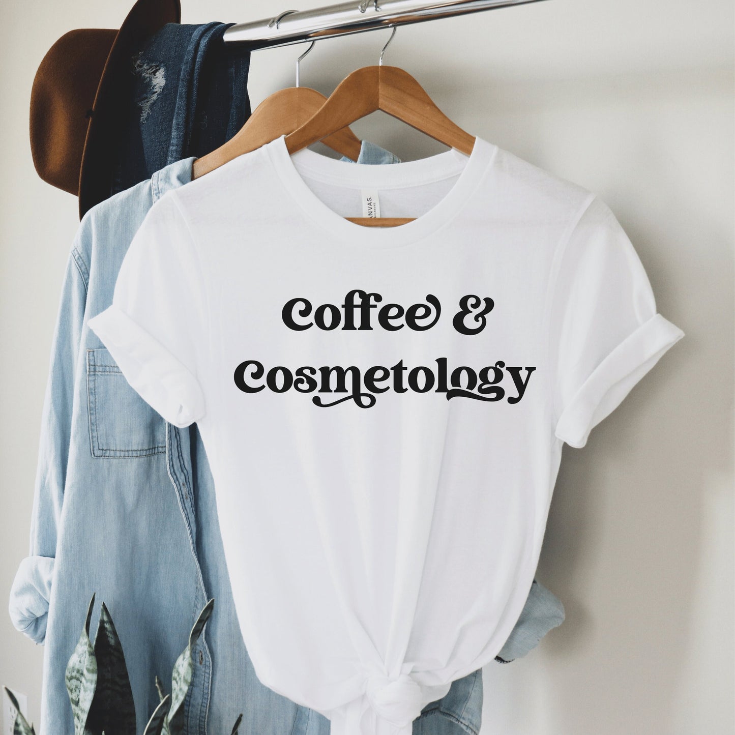 white unisex t-shirt and cosmetology gift ideas that says coffee and cosmetology across the front in stylish font