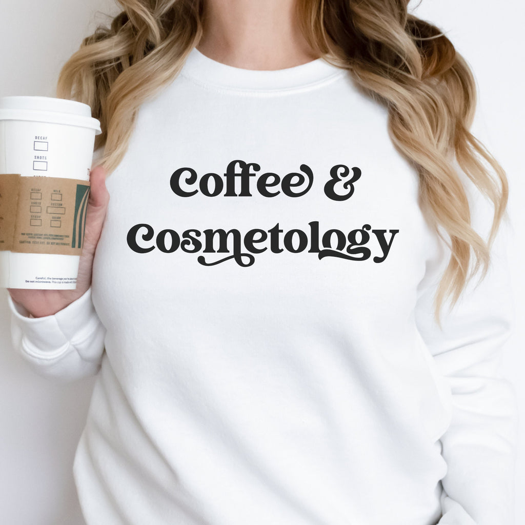 white unisex sweatshirt that says coffee and cosmetology in stylish font, cosmetology gift ideas