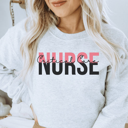 light gray critical care nurse shirt that says critical care nurse, with nurse in all capitals and colored black and pink, with the word critical care in black script overlaying the word nurse