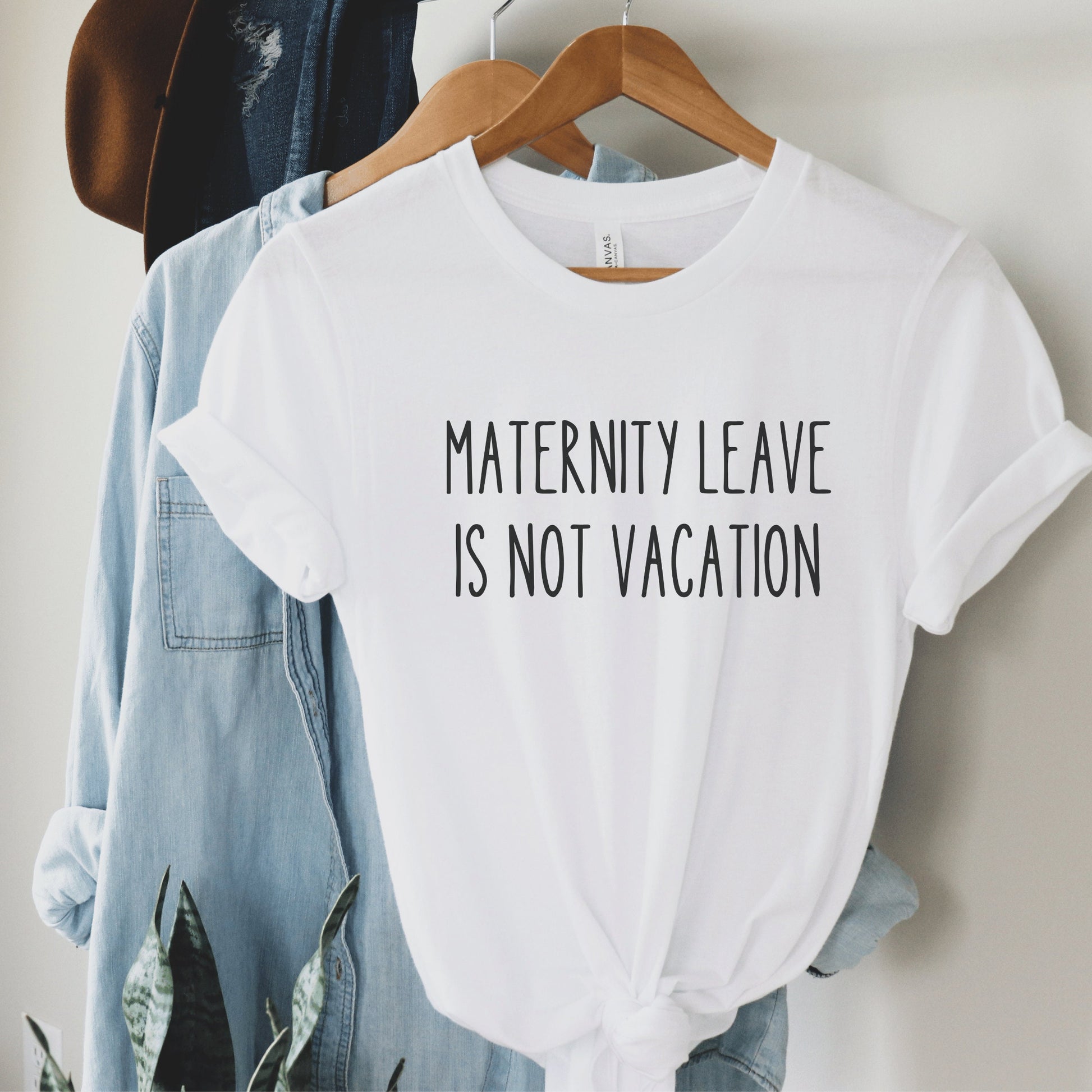 white unisex gifts for nursing moms tshirt that says maternity leave is not vacation